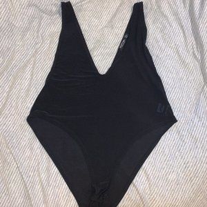 NWOT Deep V-Neck Black Bodysuit